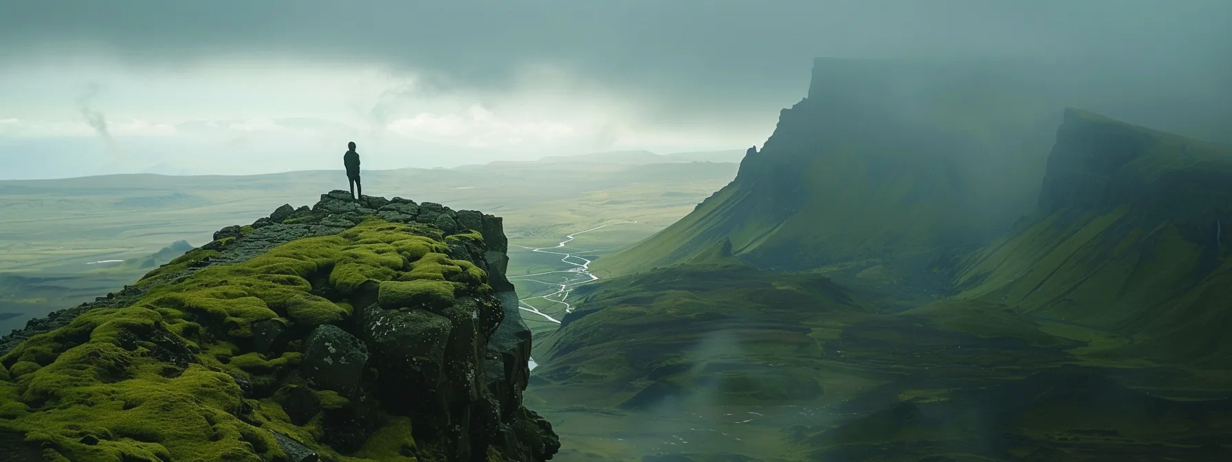 a person standing confidently on a mountaintop, overlooking a vast landscape, symbolizing self-assurance and inner strength.